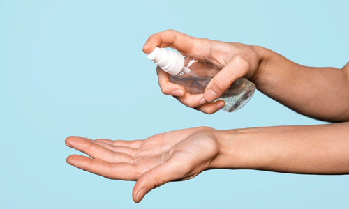  Spraying Hand Sanitizer