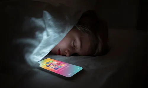 Child using a smartphone before bedtime