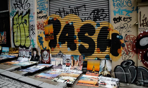 A series of graffiti in a street