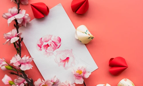 Colorful Valentine’s Day greeting cards with heart-themed decorations decorations paper arts and flowers