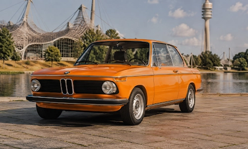 Orange BMW 1602e electric concept car from the 1972 Munich Olympics